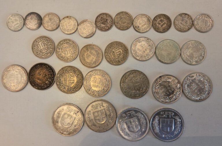 Read more about the article Lot of Swiss silver Coins all before 1967 (28 coins)