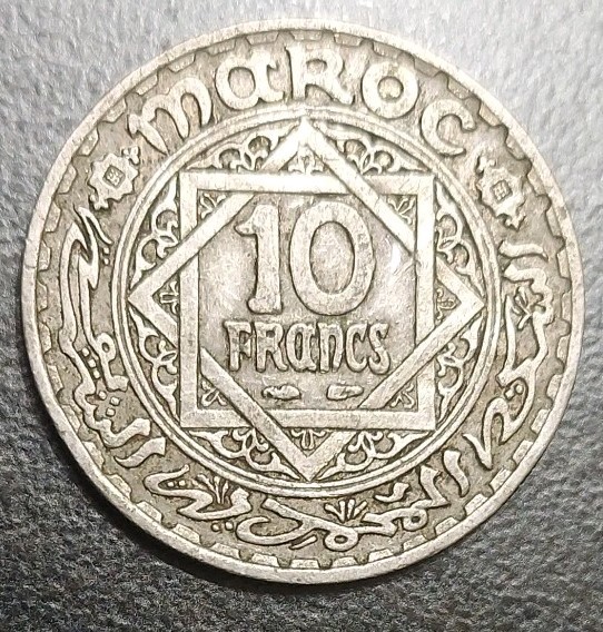 Read more about the article 1947 MOROCCO KING MOHAMMED V 10 FRANCS OLD CN COIN 1366-AH KM 44