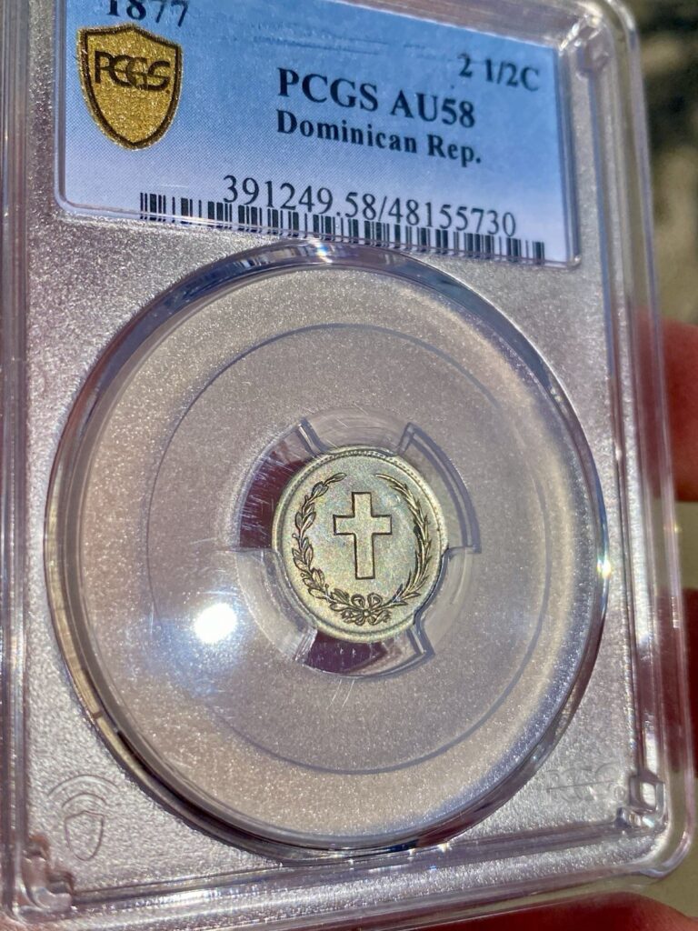 Read more about the article Dominican Republic  1877  2 1/2 Centavos – CROSS – PCGS AU-58
