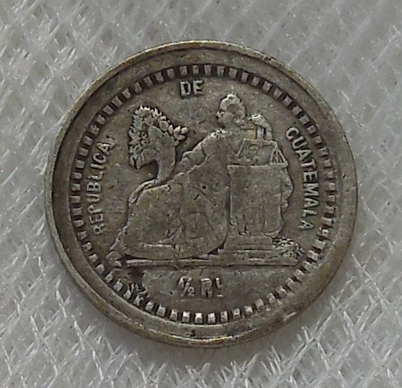 Read more about the article 1879 D GUATEMALA 1/2 REAL SILVER COIN