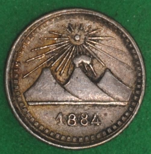 Read more about the article 1884 Guatemala 1/4 Real XF