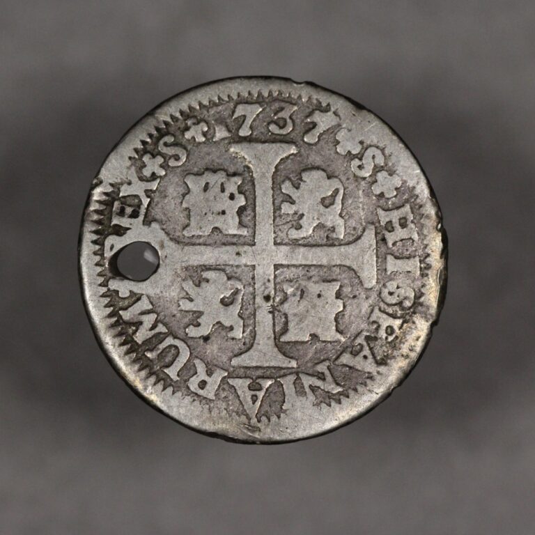 Read more about the article 1737 Spain Silver 1/2 Real -Holed-