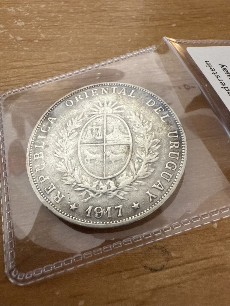 Read more about the article Uruguay – 1917 Large Silver Peso Toned with Edge Lettering  Rare Coin!