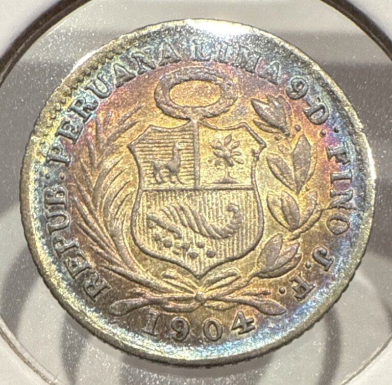 Read more about the article 1904 1/2 Dinero Peru Silver Coin Half Dinero – BU  Detail and Rainbow Toning