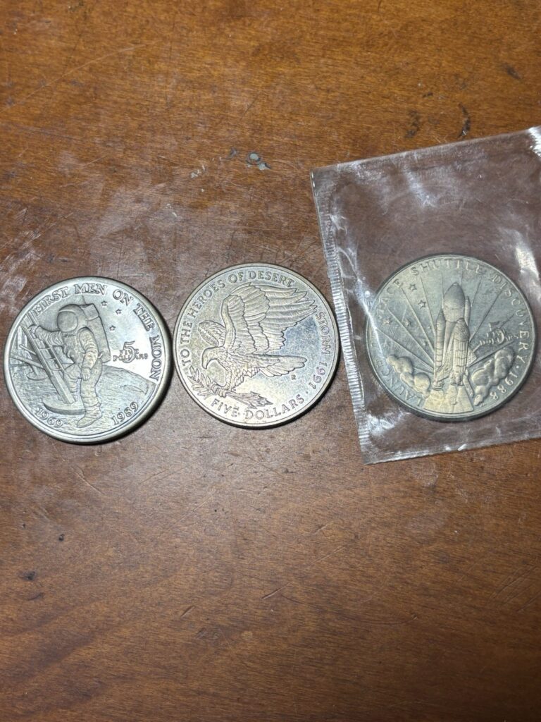 Read more about the article Set Of 3 Marshall Island Seal Coins-Desert Storm  Shuttle Discovery  Men On Moon