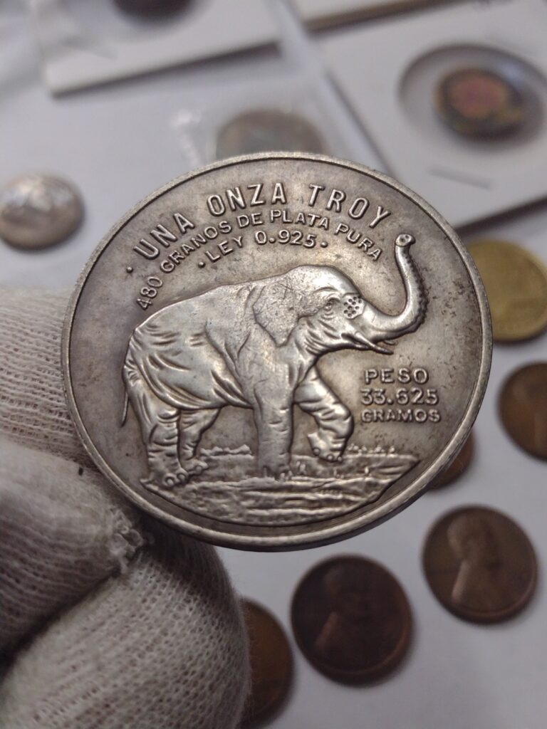 Read more about the article DE MEXICO 1951 CASA MONEDA. UNA ONZA TROY 41.9X2.9 MM. OLD NOVELTY-SOUVENIR COIN
