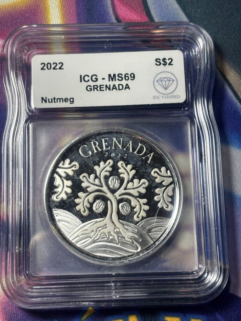 Read more about the article Grenada 2022 1 oz .999 Silver $2 Nutmeg Tree Capsule IGC Ms-69