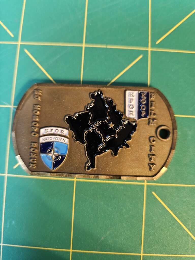 Read more about the article KFOR Peacekeeping Challenge Coin Kosovo UN United Nations Film City Police NATO