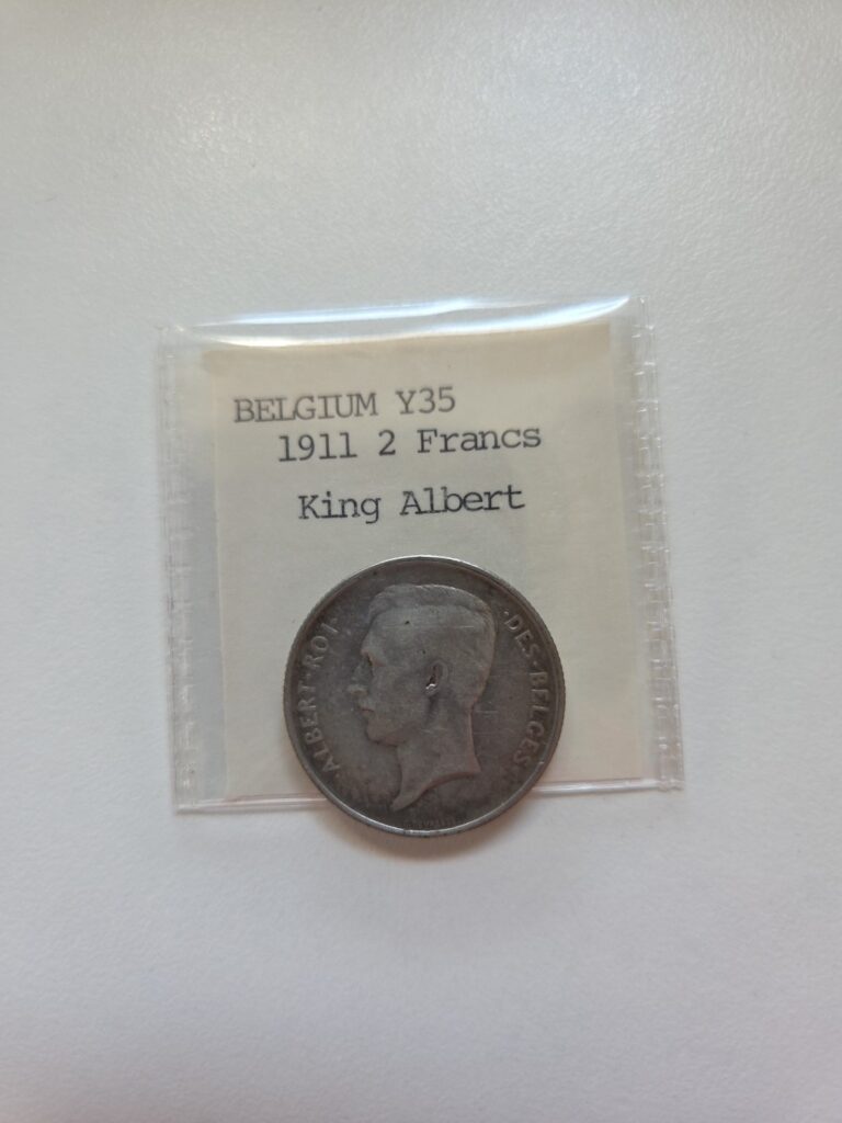 Read more about the article 1911 Belgium 2 Francs Silver Coin Featuring King Albert Dutch Legend
