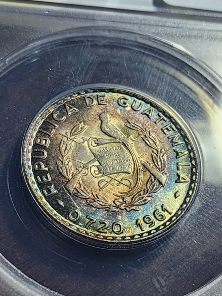 Read more about the article 1961 Guatemala 25 Centavos ANACS MS 63 Mint State BU RAINBOW TONED