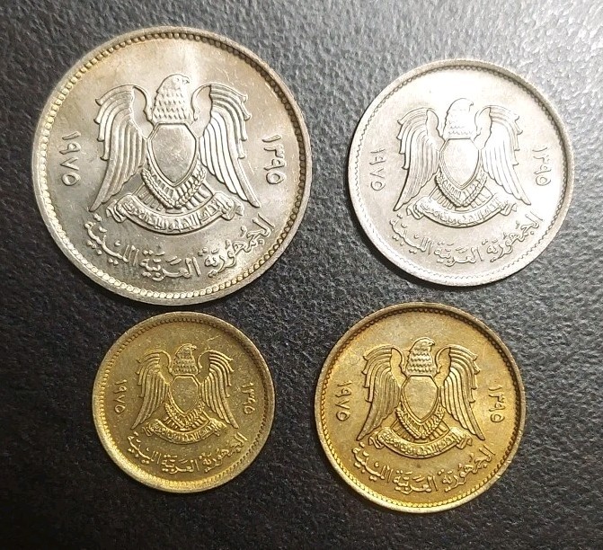 Read more about the article 1975 LIBYA 1 5 10 20 DIRHAM DIRHAMS 4 PCS SHORT SET VINTAGE LIBYAN UNC COINS