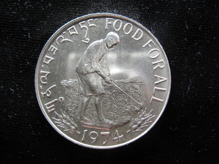 Read more about the article Large old world SILVER coin BHUTAN 15 ngultrums 1974 KM42 FAO Rice farmer (227)