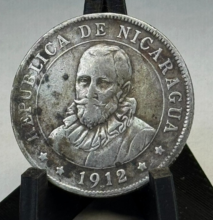 Read more about the article 1912 Nicaragua 25 Centavos KM# 14  Silver  Sun and Mountains