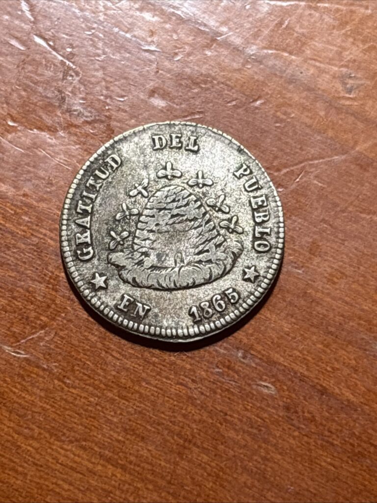Read more about the article 1865 Bolivia 1/10 Boliviano Proclamation Silver Coin