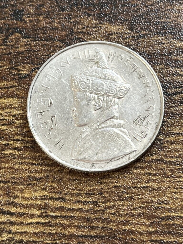 Read more about the article 1928 Bhutan 1/2 Half Rupee Nickel Actual Coin TB7173*
