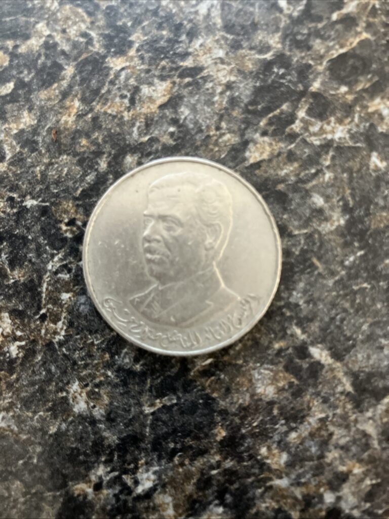 Read more about the article Iraq 250 Fils 1st Anniversary President Saddam Hussein MS63 PCGS CuNi Coin 1980