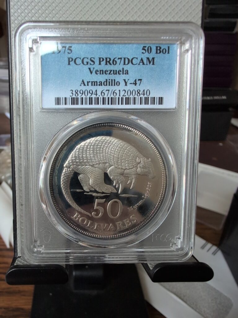 Read more about the article Venezuela 1975 50 Bolivares Silver Coin. PCGS PR67DCAM Venezuela Armadillo Y-47.