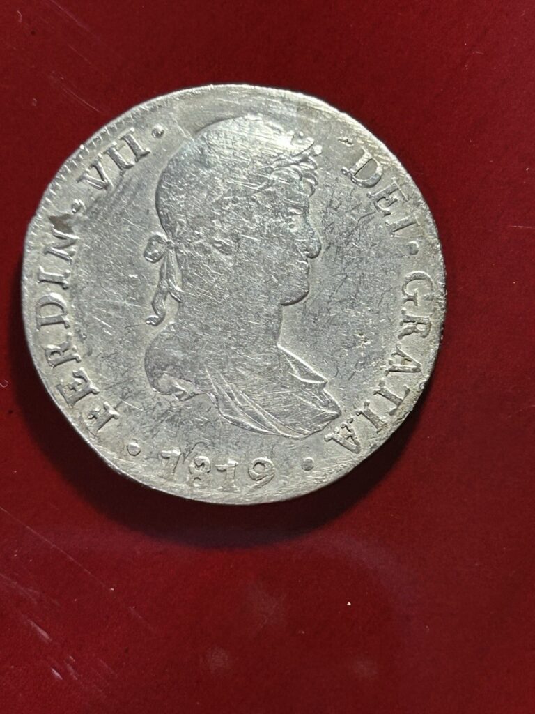 Read more about the article 1819 Peru 8 Reales Raw Coin