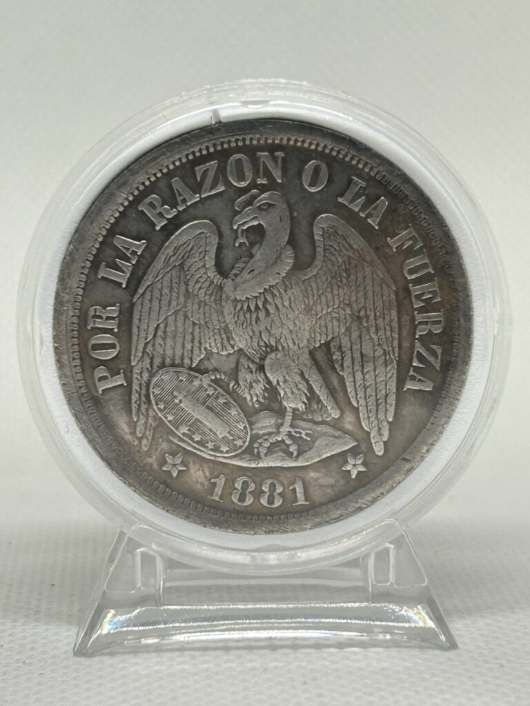 Read more about the article 1881 Republic De Chile 🇨🇱 UN PESO Silver Coin In A Display Case 💯✨