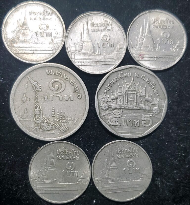 Read more about the article Lot of 7 Thai 1 Baht Temple Coins with 1 Dragon RAMA IX Nice World Coins