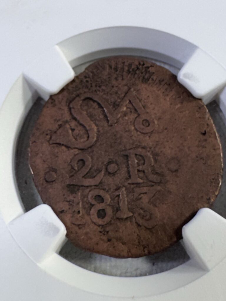 Read more about the article 1813 Mexico 2 Reales Oaxaca/Sud Insurgent Coin Graded XF 45 BN by NGC