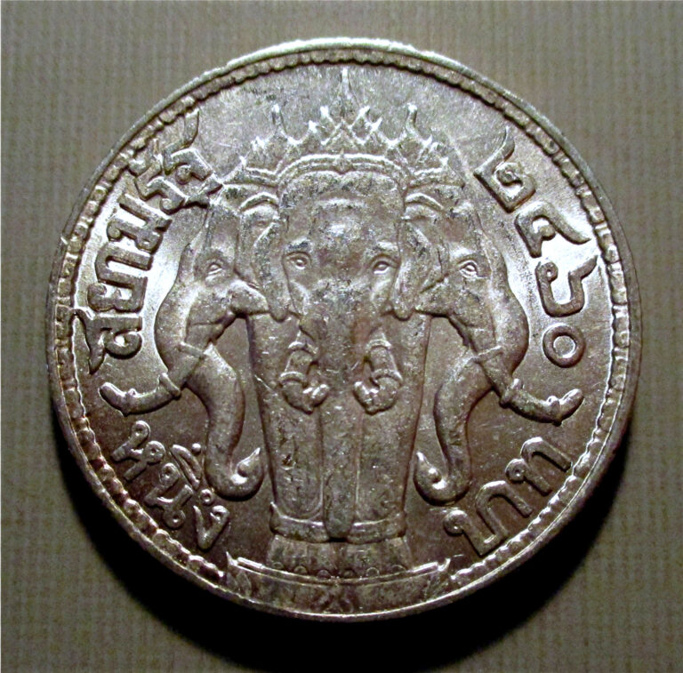 Read more about the article THAILAND-T.2460=1917AD- 1 SILVER BAHT-BUST OF RAMA VI-ELEPHANT HEADS- Y#45 ICGK6