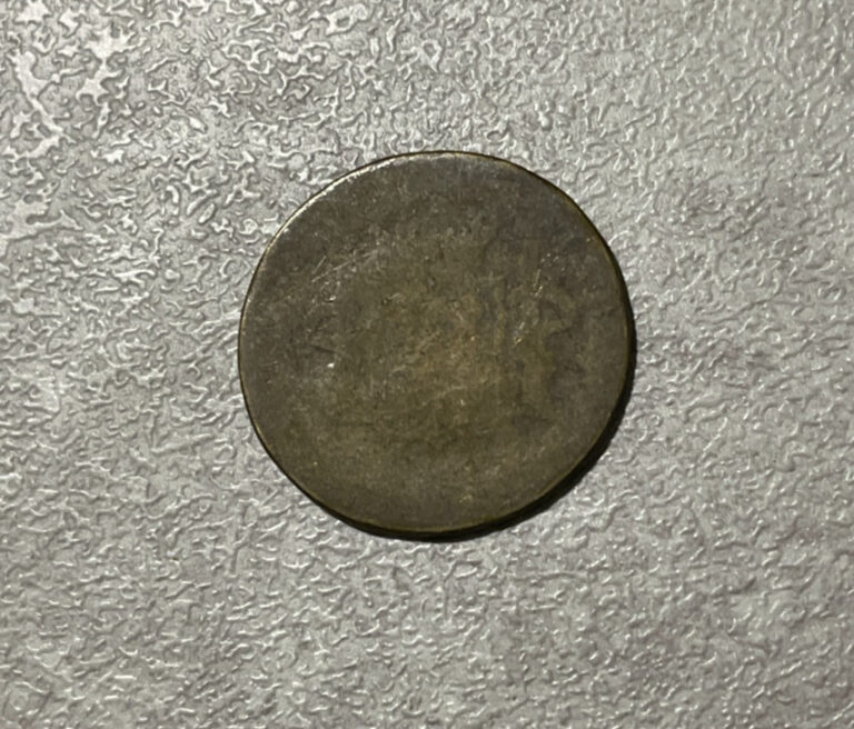 Read more about the article Undated Spanish Colonial 2 Reales Brass Contemporary CC – Nearly Worn Away L2