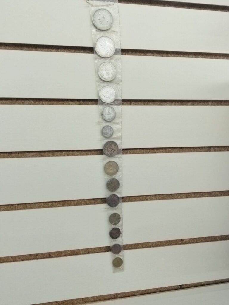 Read more about the article OLD SEWN STOCKING W/ 14 LITHUANIA SILVER and BRONZE WORLD COINS 1920-1938