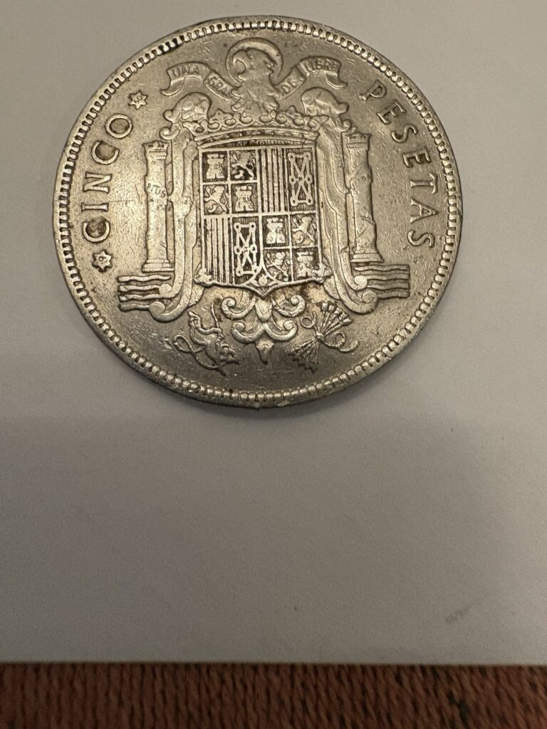 Read more about the article 1949 Francisco Cinco Pesetas Coin Has Dents On Coin