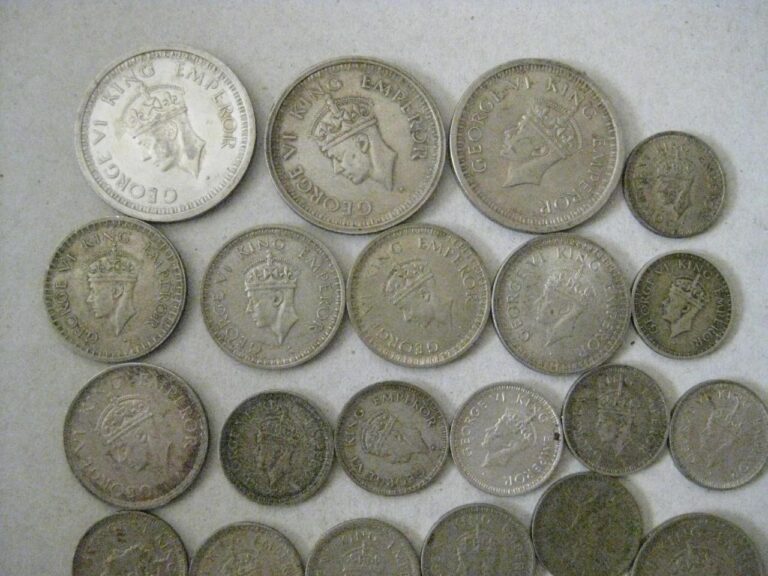 Read more about the article India lot of 25 .500 silver coins 1/4 1/2 1 1940’s King Geoge VI  1.9032 ASW #54
