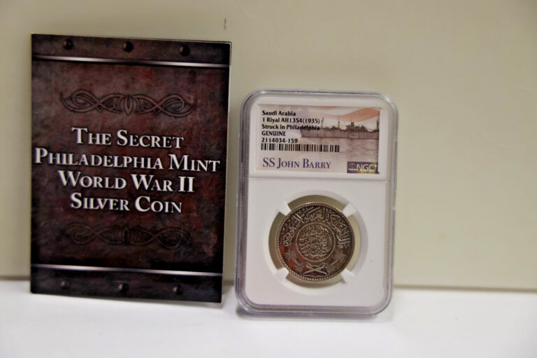 Read more about the article Saudi Arabia (1935) 1 Riyal AH1354 SS John Barry Shipwreck Silver NGC