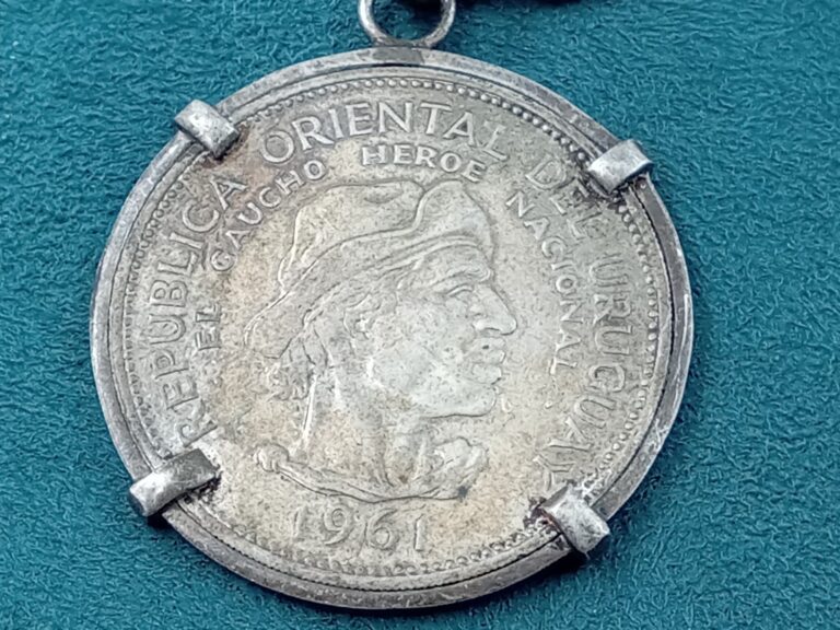 Read more about the article 1961 Nation of Uruguay 10 Peso .900 Fine Coin key chain : 5.75″ Long and 26 grams