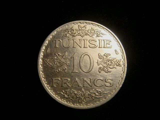 Read more about the article TUNISIA.AHMED BEY.  10 FRANCS 1353 AH. KM 262. Gadoury  99.  0.680 Silver.
