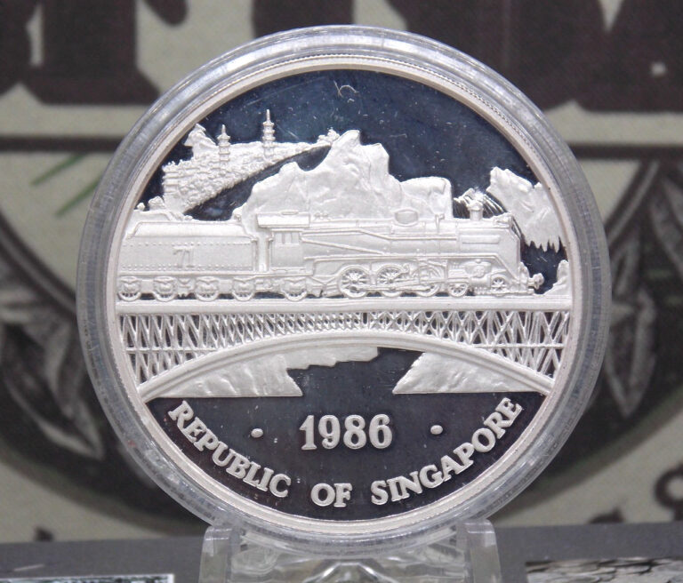 Read more about the article 1986 Singapore *MALAYSIA-RAILROAD” 1oz .999 Fine Silver Coin w/Capsule ECCandC Inc
