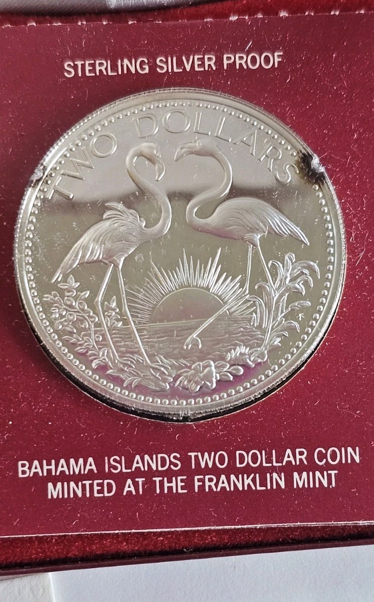 Read more about the article 1976 Bahamas $2 Proof Sterling Silver Flamingo Coin w/ Original Box and COA