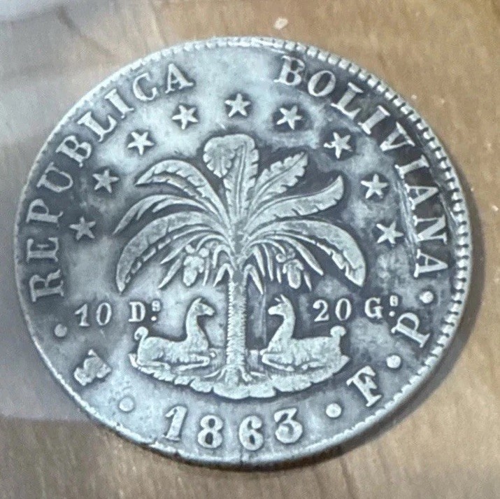 Read more about the article Rare Boliva 1863 Potosi 8 Soles – Silver Coin w/ Simon Bolivar and Lettered Edge!