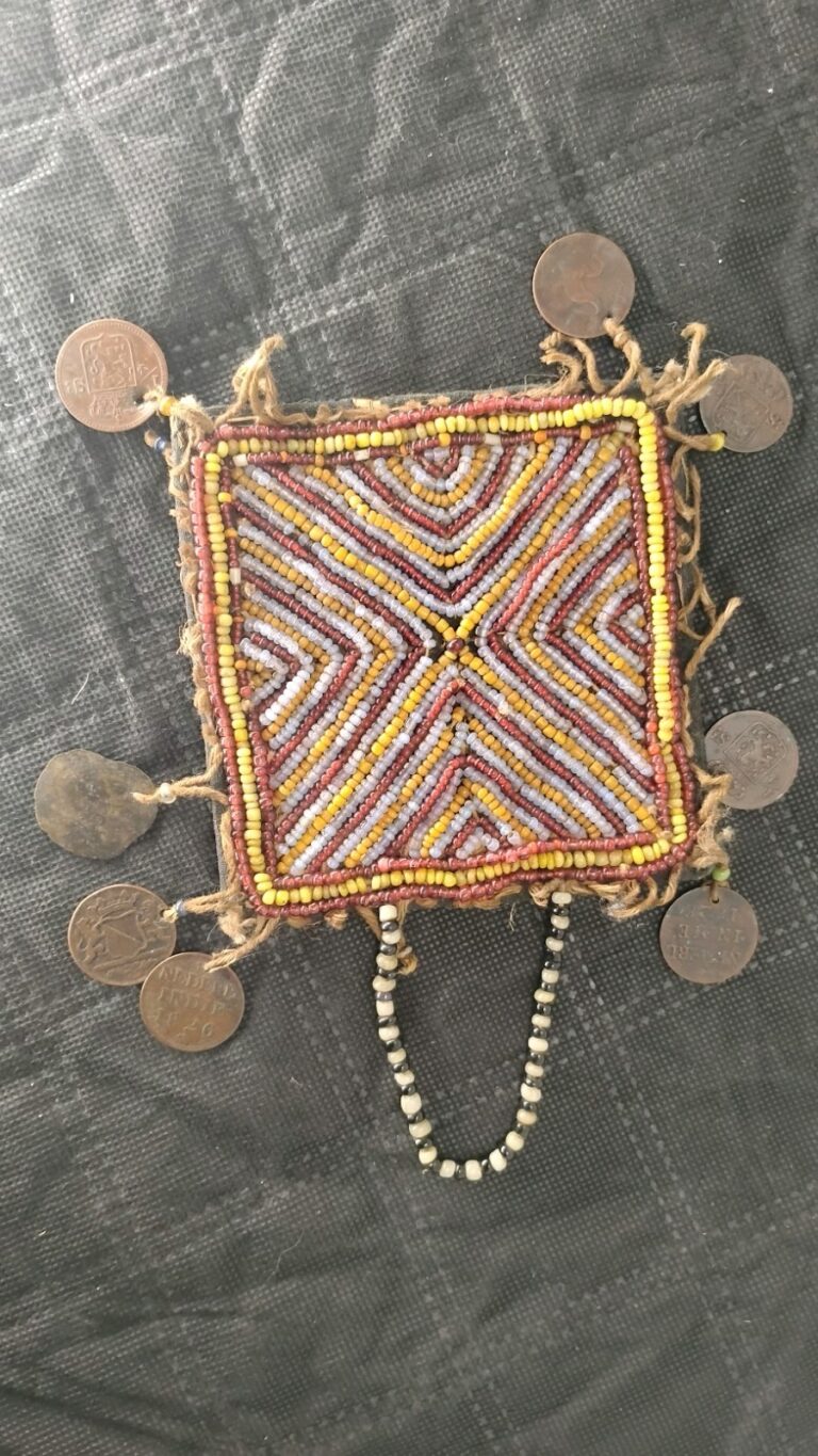 Read more about the article Exceptionally Rare 1826 Dutch East Indies Beaded Amulet with 8 Authentic Coins