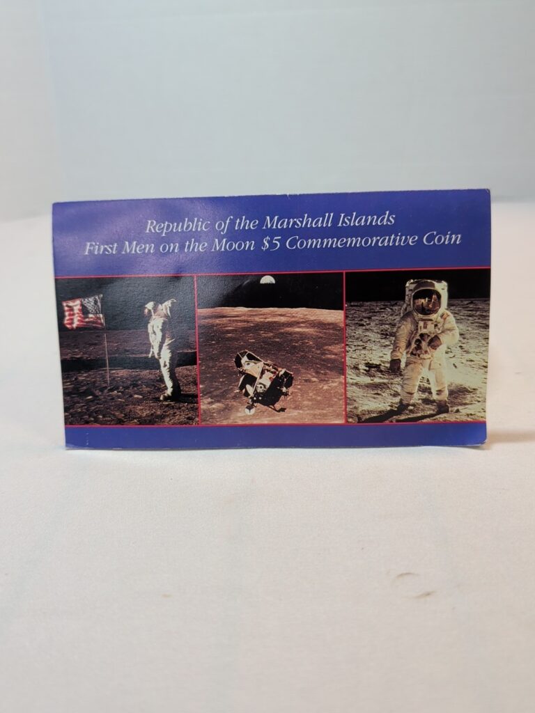 Read more about the article 1989 Marshall Islands $5 Commemorative First Men on Moon Apollo 11  BU Coin