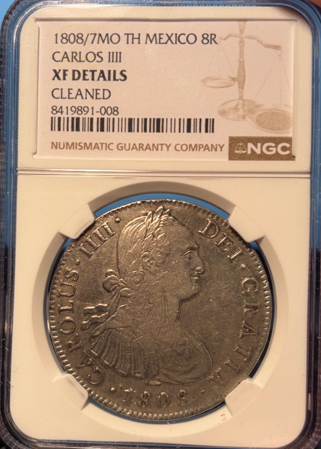 Read more about the article Mexico 8 Reales Mo 1808/7 T.H. Charles IIII  NGC AU Details. Freshly Graded