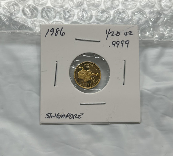 Read more about the article 1986 Singapore 5 Singold Year Of The Tiger 1/20th Oz .999 Gold